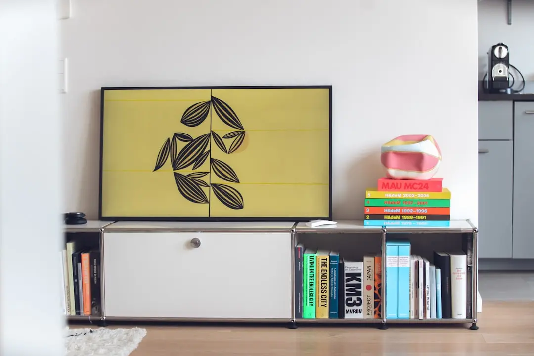Illustrative interior: styled media console with art for L&T Aravista Sector 81-86 homes