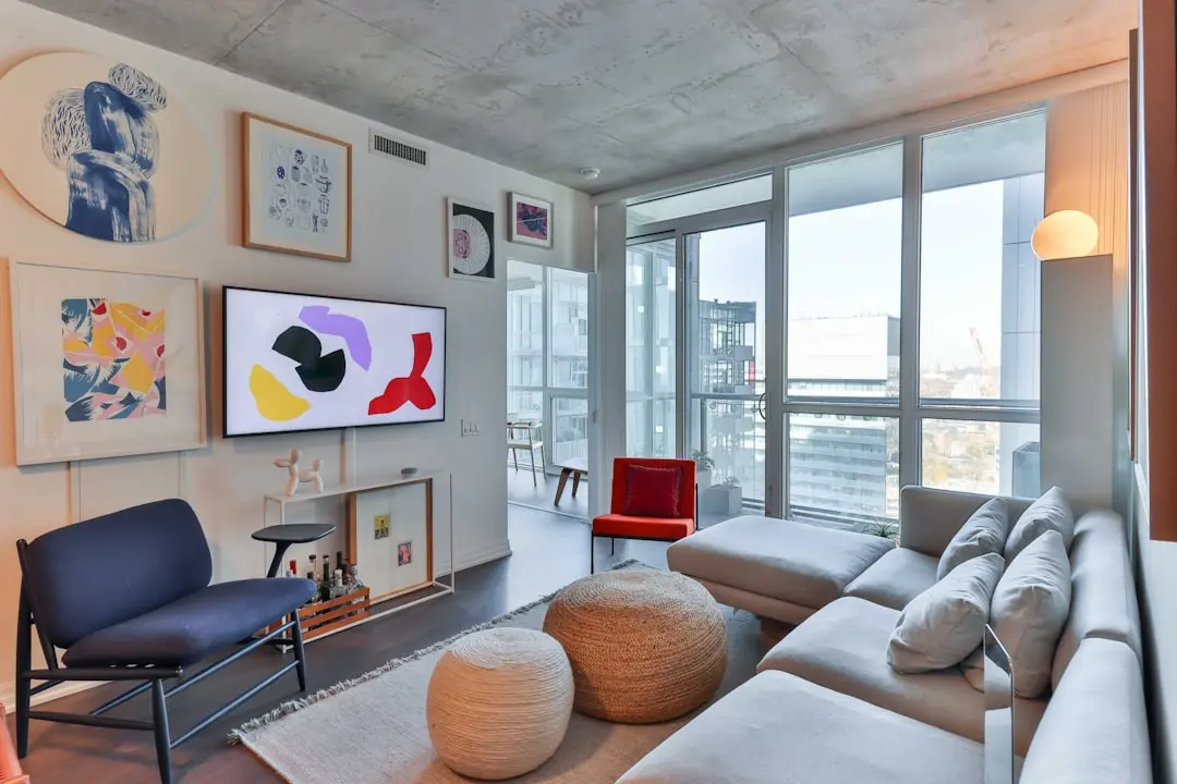 Illustrative visual: bright living room with city views for L&T Aravista Sector 81-86