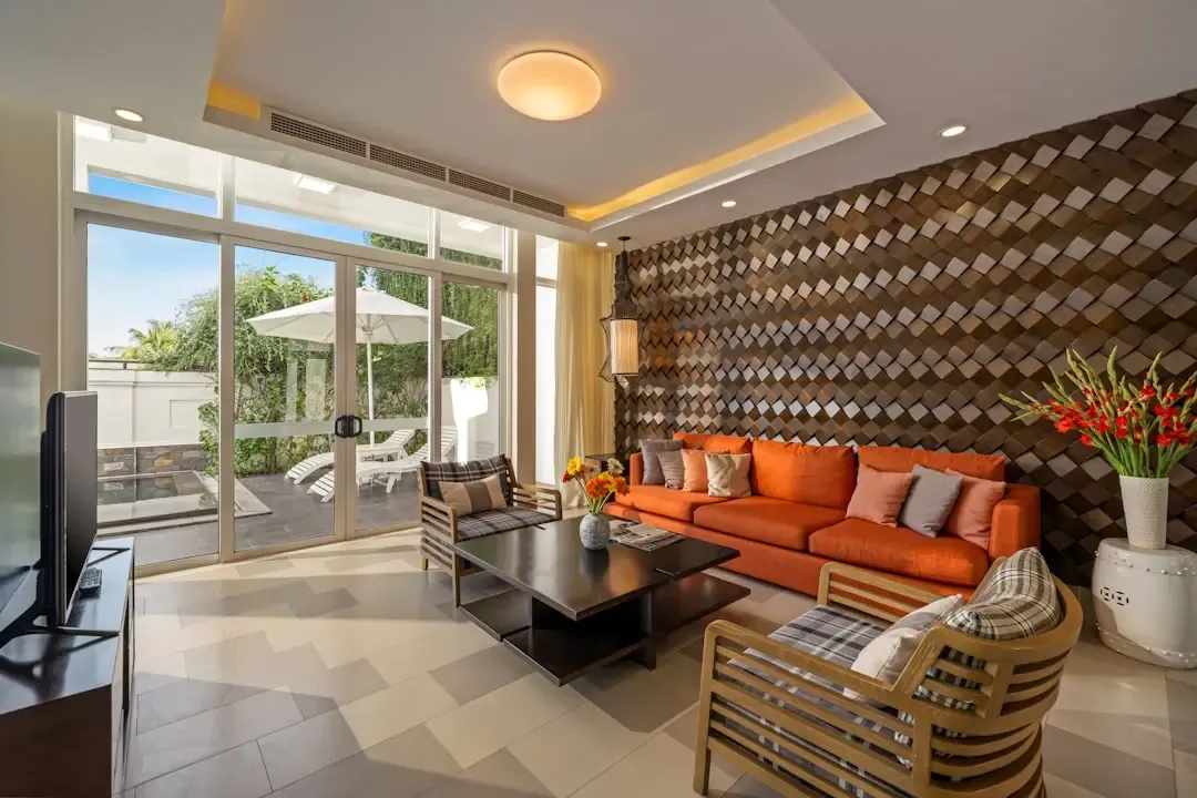 Illustrative interior: living room opening to a private outdoor sit-out for L&T Aravista Sector 81-86 homes