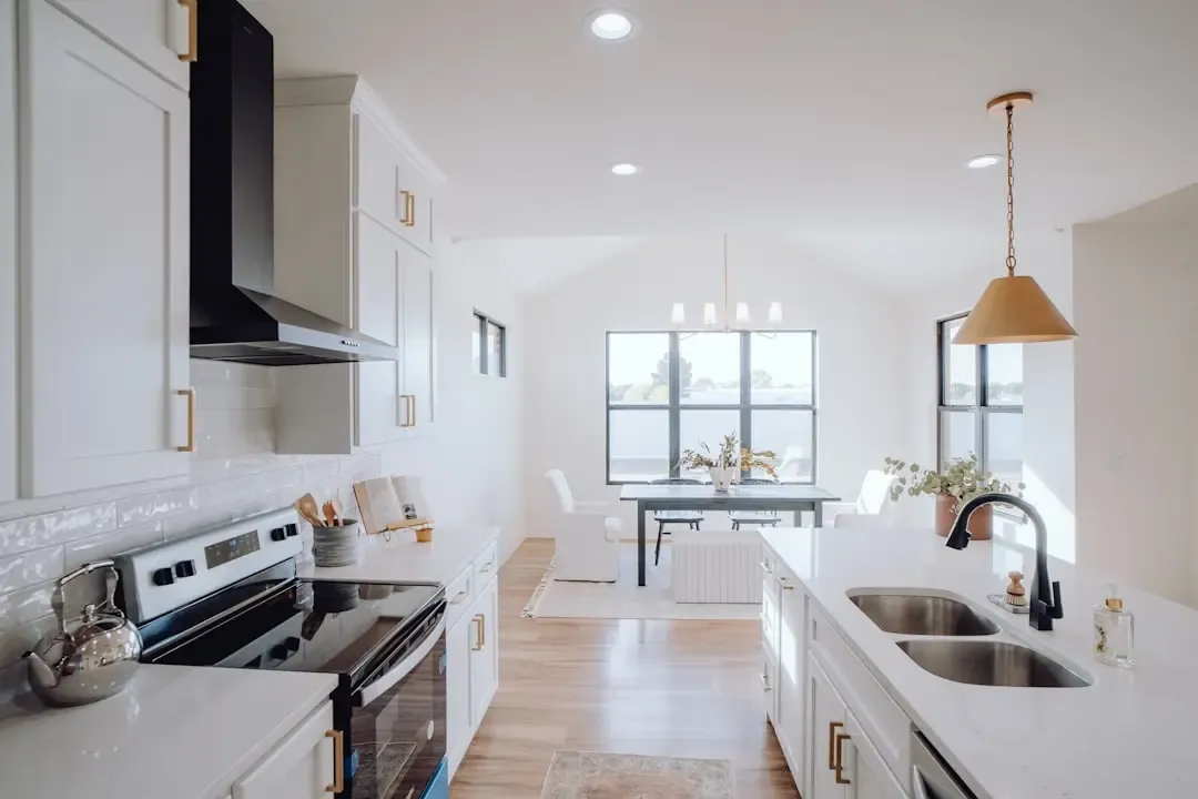 Illustrative interior: open kitchen with dining view for L&T Aravista Sector 81-86 homes